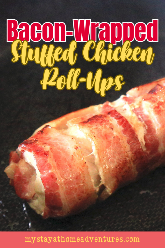 A golden, crispy bacon-wrapped chicken roll-up resting on a dark surface, showcasing its juicy, savory exterior.