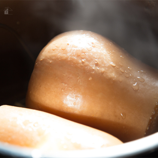 Steaming butternut squash halves in an Instant Pot, showing a quick and easy method for preparing a healthy fall side dish.