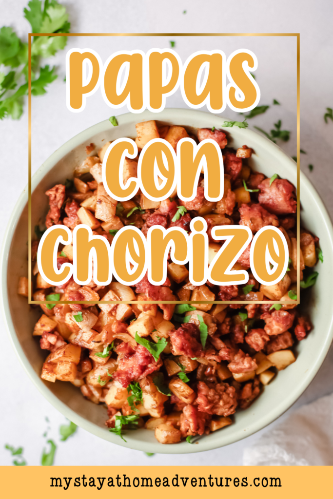 A bowl of Papas con Chorizo, a traditional Mexican dish featuring diced potatoes and savory chorizo, garnished with fresh cilantro.