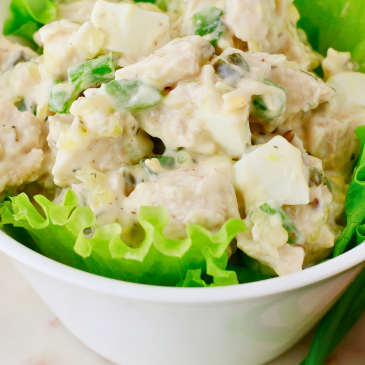 Classic chicken salad recipe made with tender chicken, hard-boiled eggs, celery, and a creamy mayo dressing, served on crisp lettuce—perfect for sandwiches, wraps, or a quick and easy meal.