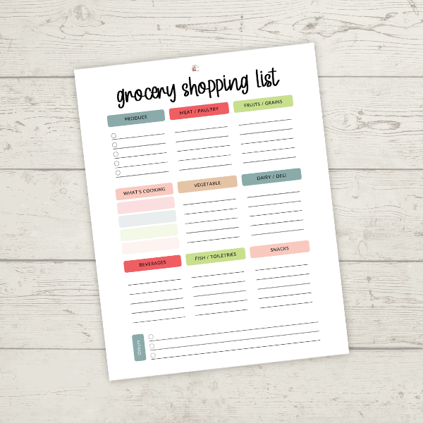 grocery shopping list printable sheet on white wood background.