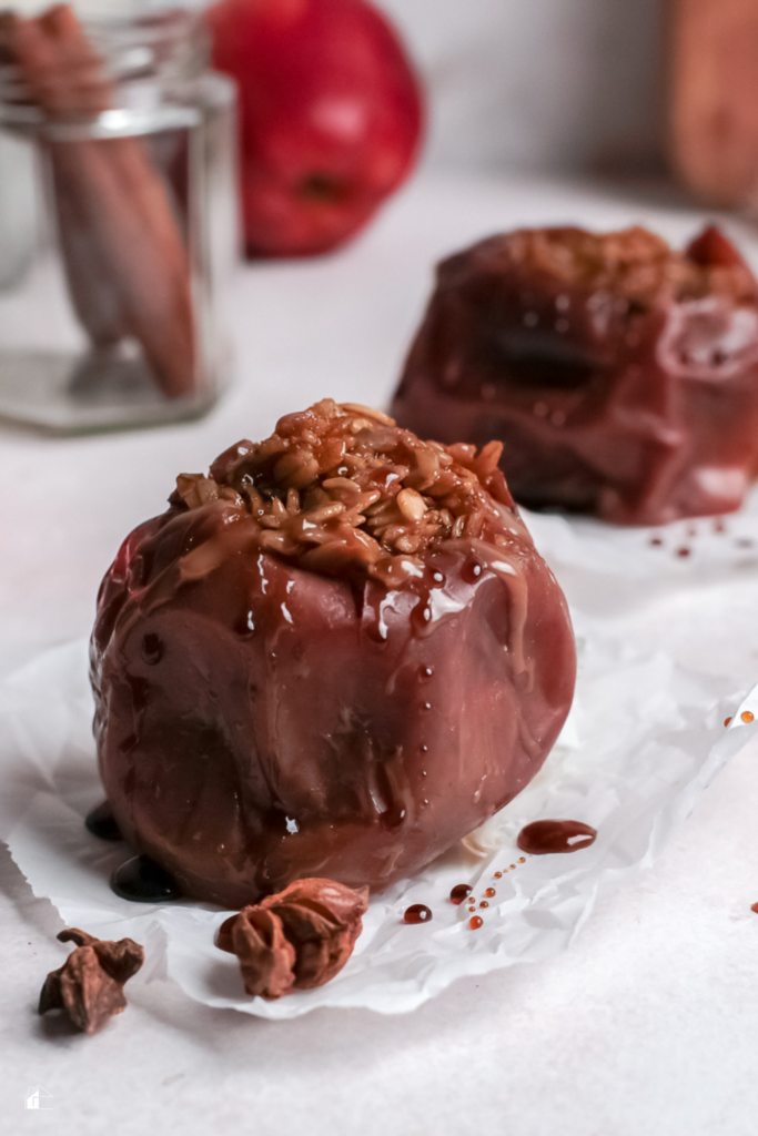 Warm, baked apples stuffed with oats and spices, drizzled with caramel sauce, perfect for a quick and healthy fall dessert made in the Instant Pot.