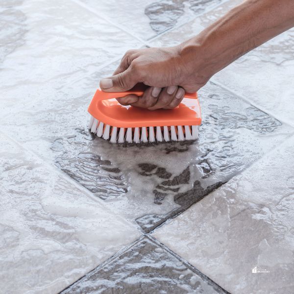 cleaning a tile