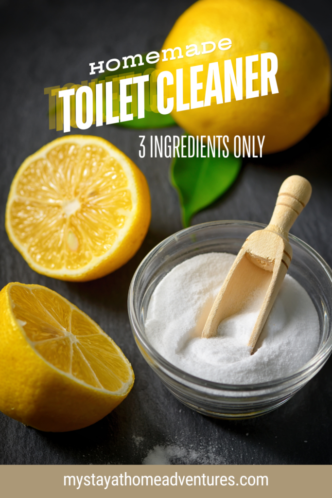 A bowl of baking soda with a wooden scoop surrounded by fresh lemon halves, showcasing ingredients for an eco-friendly, non-toxic, and easy homemade toilet cleaner recipe.