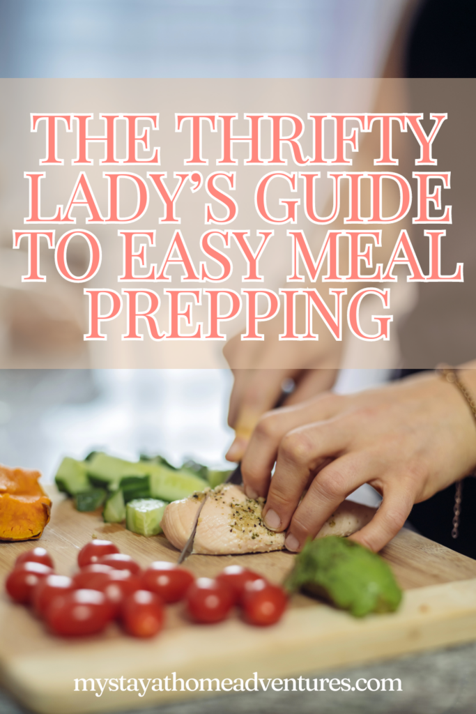 An image of a woman cutting a chicken breast, with other ingredients around, with the text - The Thrifty Lady’s Guide to Easy Meal Prepping. The site's link is also included in the image.
