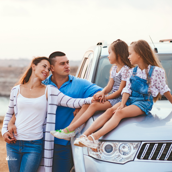 family trip by car on a seashore