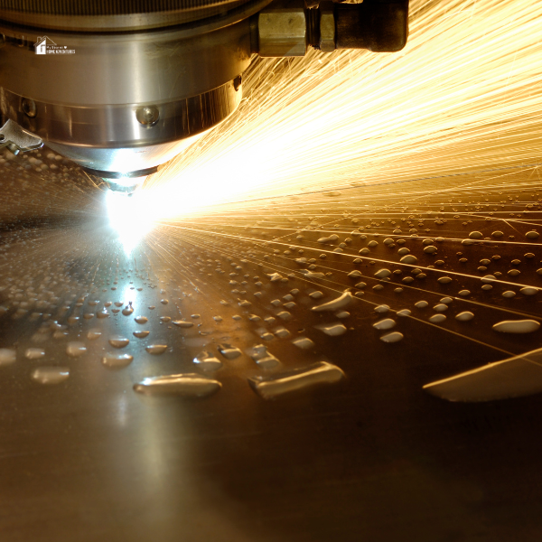 A detailed view of a laser beam cutting through metal, emphasizing the accuracy and creative potential of laser cutters for stay-at-home crafting enthusiasts.